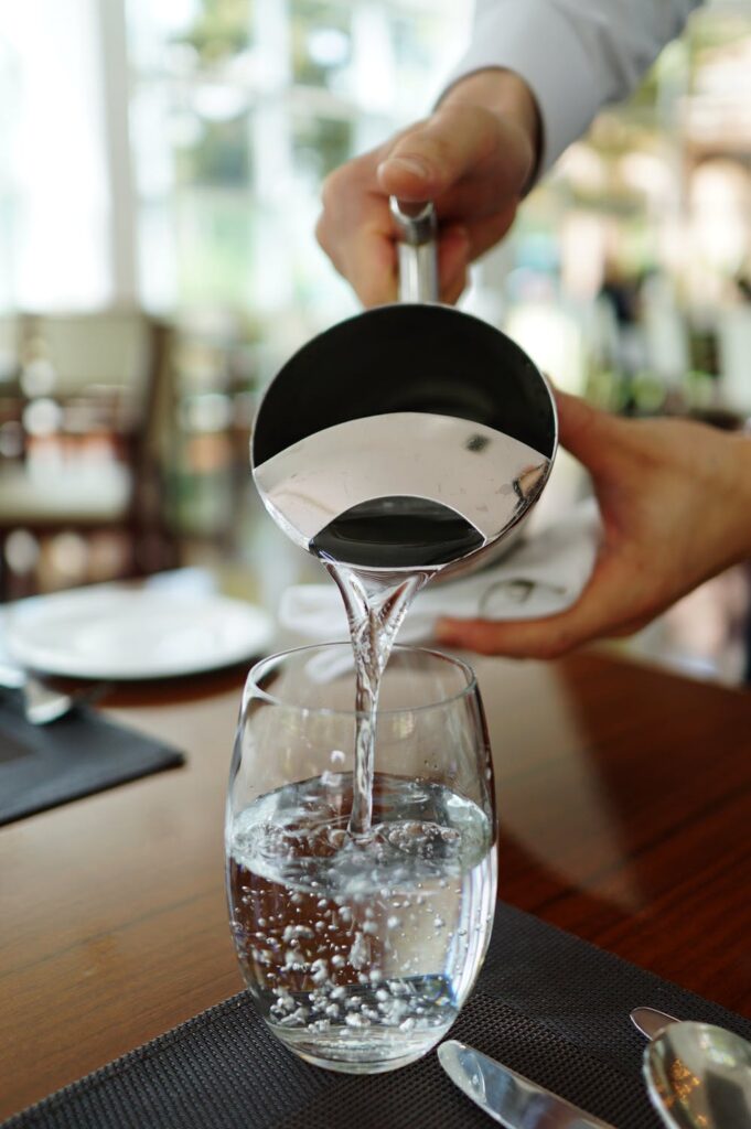 https://www.palintest.com/wp-content/uploads/2024/12/glass-of-water-being-poured.jpeg